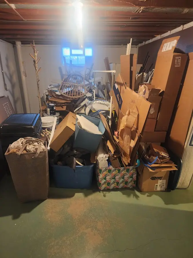 Roll-off dumpster container at job site for 8 Yard Dumpster Rental in Chesaning